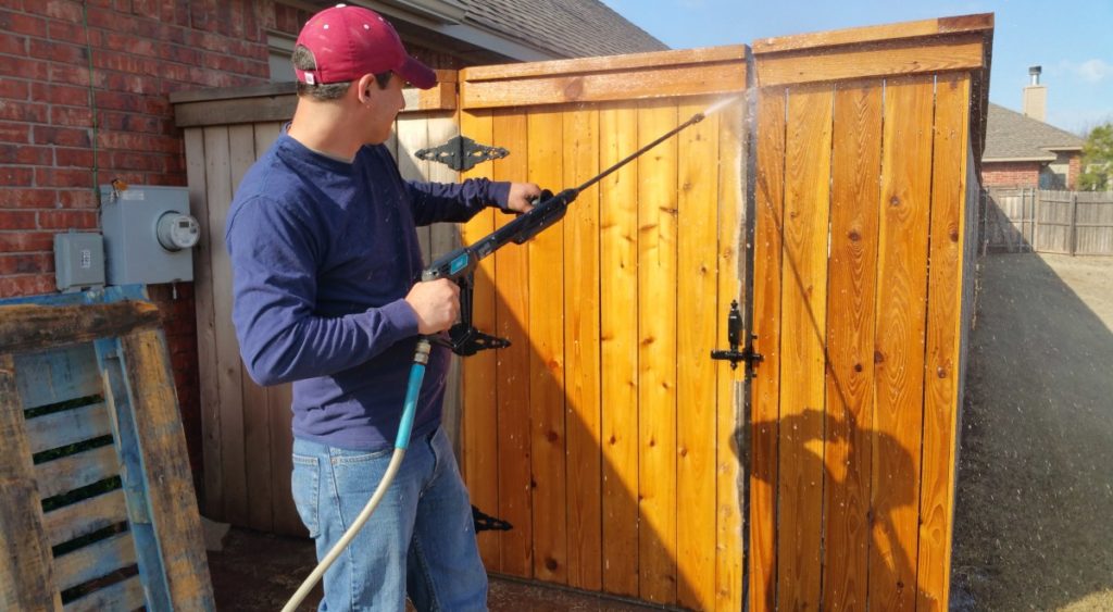 pressure washing and staining fence
